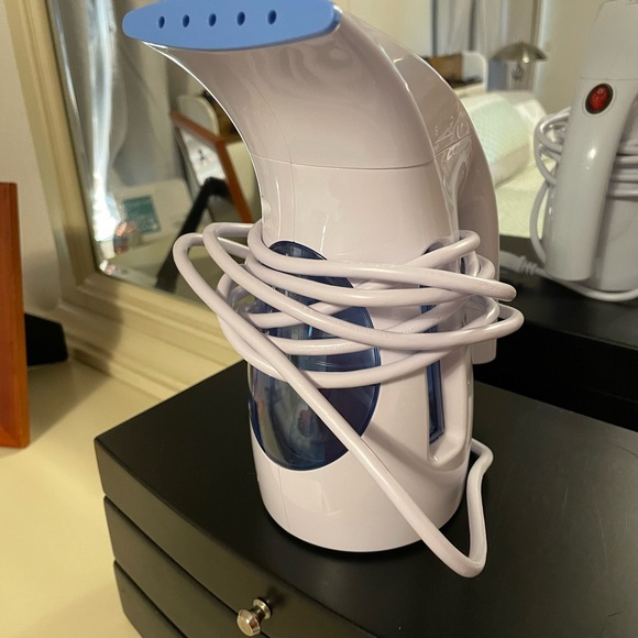 Like new garment steamer. Used once. hasbrush attachments. Distilled water rec. - Picture 3 of 4